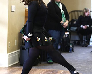 Kristen Eckman, 16, of Poland dances as the Burke Irish Dancers perform at the Poland Library, Saturday, March 11, 2017 in Poland. ..(Nikos Frazier | The Vindicator)..