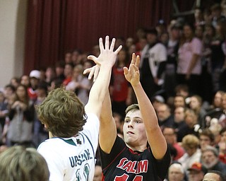 Mitch Davidson(14) of Salem puts up three during the 2nd quarter as Salem takes on Ursuline in the Division II District Final, Saturday, March 11, 2017 at Boardman High School. Ursuline won 70-33...(Nikos Frazier | The Vindicator)..