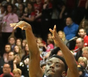 Dakota Hobbs(14) of Ursuline goes up for three during the 3rd quarter as Salem takes on Ursuline in the Division II District Final, Saturday, March 11, 2017 at Boardman High School. Ursuline won 70-33...(Nikos Frazier | The Vindicator)..