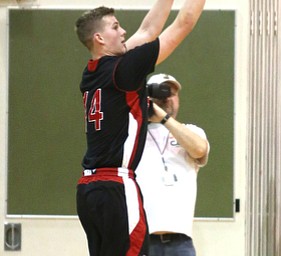 Mitch Davidson(14) of Salem goes up for three during the 3rd quarter as Salem takes on Ursuline in the Division II District Final, Saturday, March 11, 2017 at Boardman High School. Ursuline won 70-33...(Nikos Frazier | The Vindicator)..