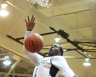 Anthony Howell(1) of Ursuline tomahawk dunks during the 4th quarter as Salem takes on Ursuline in the Division II District Final, Saturday, March 11, 2017 at Boardman High School. Ursuline won 70-33...(Nikos Frazier | The Vindicator)..