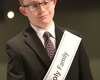        ROBERT K. YOSAY  | THE VINDICATOR.     .Holy Family George Gabriel (5)  a sign of resignation as he misses his word..West Branch eighth grade student Macey Stancato wins the 84th Regional Spelling Bee spelling the championship word "sarcoidosis" correctly..Poland's Sophie Sainato won second place and four-time returnee Angela McKenna from Girard won third place...-30-