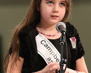        ROBERT K. YOSAY  | THE VINDICATOR.     .Campbell Elementary and Middle Karen Donald (4) tstops and thinks before spelling her word.\.West Branch eighth grade student Macey Stancato wins the 84th Regional Spelling Bee spelling the championship word "sarcoidosis" correctly..Poland's Sophie Sainato won second place and four-time returnee Angela McKenna from Girard won third place...-30-