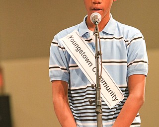        ROBERT K. YOSAY  | THE VINDICATOR.     .Anthony Thomas   works on spelling his word..West Branch eighth grade student Macey Stancato wins the 84th Regional Spelling Bee spelling the championship word "sarcoidosis" correctly..Poland's Sophie Sainato won second place and four-time returnee Angela McKenna from Girard won third place...-30-