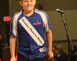        ROBERT K. YOSAY  | THE VINDICATOR.     .Cooper Seeley  Western Reserve Middle School all smiles as he spells his word right..West Branch eighth grade student Macey Stancato wins the 84th Regional Spelling Bee spelling the championship word "sarcoidosis" correctly..Poland's Sophie Sainato won second place and four-time returnee Angela McKenna from Girard won third place...-30-