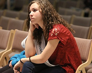        ROBERT K. YOSAY  | THE VINDICATOR.     .Brookfield Middle School Kaelyn Johns..(8)  with a look of determination.. spells her word ...West Branch eighth grade student Macey Stancato wins the 84th Regional Spelling Bee spelling the championship word "sarcoidosis" correctly..Poland's Sophie Sainato won second place and four-time returnee Angela McKenna from Girard won third place...-30-