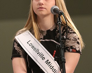       ROBERT K. YOSAY  | THE VINDICATOR.     .Lowellville middle School Bella Eliser ... looks to a higher power  before spelling her word..West Branch eighth grade student Macey Stancato wins the 84th Regional Spelling Bee spelling the championship word "sarcoidosis" correctly..Poland's Sophie Sainato won second place and four-time returnee Angela McKenna from Girard won third place...-30-