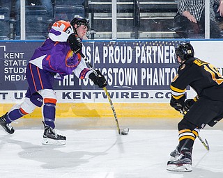 Scott R. Galvin | The Vindicator.Youngstown Phantoms defenseman Michael Karow (27) takes a shot on net during the second period against the Green Bay Gamblers at the Covelli Centre on March 4, 2017...