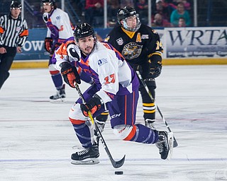 Scott R. Galvin | The Vindicator.Youngstown Phantoms forward Sam Craggs (17) skates the puck into the offensive zone during the second period against the Green Bay Gamblers at the Covelli Centre on March 4, 2017...