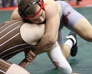 David Crawford of Canfield defeats Tarin Rauch of Uhrichsville Claymont to head to the Semi Finals in the 170# DivII. Photos By Mary Beidelschies.