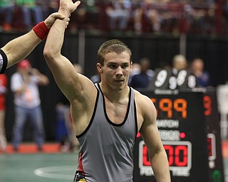 David Crawford of Canfield defeats Tarin Rauch of Uhrichsville Claymont to head to the Semi Finals in the 170# DivII. Photos By Mary Beidelschies.