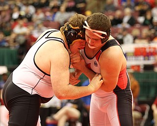 Mason Giordano heads to the Finals for Canfield in the 285# weight class after defeating Sam Mitchell from Warsaw River View. Photo by Mary Beidelschies.