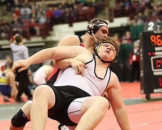 Mason Giordano heads to the Finals for Canfield in the 285# weight class after defeating Sam Mitchell from Warsaw River View. Photo by Mary Beidelschies.