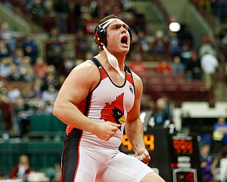 Canfield's Mason Giordano reacts to his pin of River View's Sam Mitchell in a semi-final 285 pound match during the Division II Ohio state wrestling tournament at the Ohio State University Friday, March 10, 2017. (Photo by Paul Vernon)
