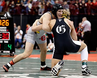 Canfield's Dominic Cooper, left, works against Graham's Dominc Cooper in a semi-final 182 pound match during the Division II Ohio state wrestling tournament at the Ohio State University Friday, March 10, 2017. (Photo by Paul Vernon)