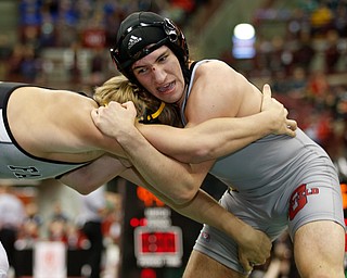 Canfield's Dominic Cooper, right, works against Graham's Dominc Cooper in a semi-final 182 pound match during the Division II Ohio state wrestling tournament at the Ohio State University Friday, March 10, 2017. (Photo by Paul Vernon)