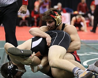 Georgio Poullas of Canfield defeats Noah Clary of Upper Sandusky to head to the Semi Finals in the 160# DivII bracket. Photo by Mary Beidelschies.