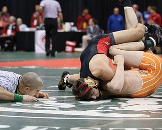 Georgio Poullas of Canfield heads to the Championship Finals after beating Ashton Eyler of Uhrichsville Claymont in the 160# Div II.  Photo by Mary Beidelschies.