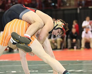 Georgio Poullas of Canfield heads to the Championship Finals after beating Ashton Eyler of Uhrichsville Claymont in the 160# Div II.  Photo by Mary Beidelschies.
