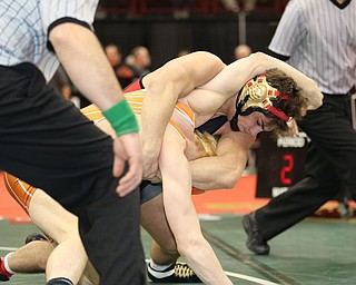 Georgio Poullas of Canfield heads to the Championship Finals after beating Ashton Eyler of Uhrichsville Claymont in the 160# Div II.  Photo by Mary Beidelschies.