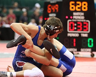 Gus Sutton of Austintown defeats Cody Moosman of White Anthony Wayne in the 120# Div I to head to the Semi Finals..Photo by Mary Beidelschies.