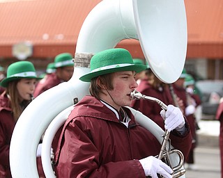 A member of the Boardman Marching Band plays the tuba during the Mahoning Valley St. Patrick's Day Parade on Market Street in Boardman, Sunday, March 12, 2017. ..(Nikos Frazier | The Vindicator)..