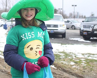 Evalyn O'Leary, 12, of Poland smiles during the Mahoning Valley St. Patrick's Day Parade on Market Street in Boardman, Sunday, March 12, 2017. ..(Nikos Frazier | The Vindicator)..