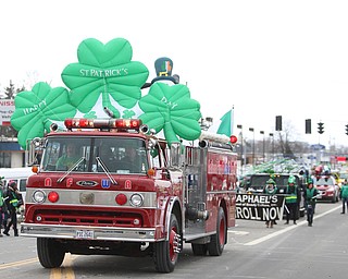 Cars stretch down the length of Market Street between McClurg Rd and Southwoods Rd during the Mahoning Valley St. Patrick's Day Parade on Market Street in Boardman, Sunday, March 12, 2017. ..(Nikos Frazier | The Vindicator)..