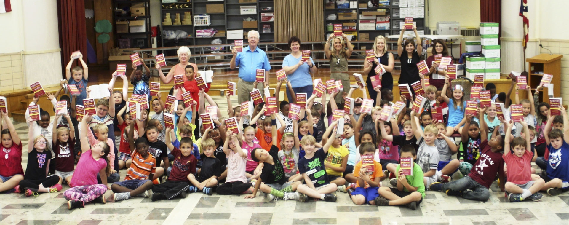 SPECIAL TO THE VINDICATOR
Boardman Rotary recently donated dictionaries to students of Boardman Market Street Elementary School. This is the 11th year they have given dictionaries to schools, with the goal of increasing the students’ vocabulary and reading abilities. Deborah S. Liptak, development director of Public Library of Youngstown & Mahoning County, is the chairman of the project. Above are  members of Boardman Rotary and Boardman Market Street Elementary School students and teachers. For information on the club, visit www.boardmanrotary.org.