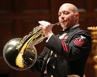 William D Lewis the vindicator  USN Chief Musician Jason Ayoub plays a French Horn solo during 3-14-17 US Navy Band concert in Youngstown.