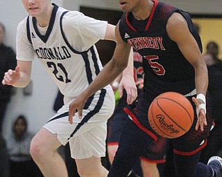 William d Lewis the Vindicator  JFK's Byron Taylor(5) drives past McDonald's Joey Ragozzine(21).