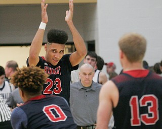 William D. Lewis the Vindicator JFK's Antonio McQueen(23) reacts after his team beat McDonald 3-15-17 at HArding.