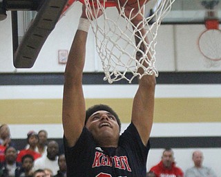 William d Lewis the Vindicator  JFK's Antonio McQueen(23) dunks during 4th qtr of win over McDoanld.