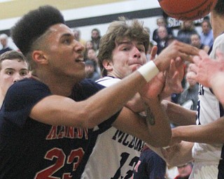 William d Lewis the Vindicator  JFK's Antonio McQueen(23) and McDonalds Dylan Portolese(13) go for a loose ball.