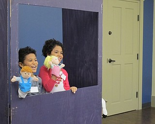 Neighbors | Alexis Bartolomucci.Children finished their play "The Boy Who Cried Wolf" and stood for a bow during the Puppet Project program at the Boardman library on Feb. 20.
