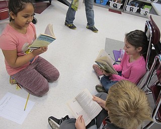 Neighbors | Alexis Bartolomucci.Students in Catherine Curtis' third-grade class read their books during the reading workshop day on Feb. 22 at Robinwood Lane Elementary.
