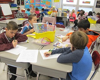 Neighbors | Alexis Bartolomucci.Students worked on an assignment on character traits after learning about it in their reading workshop on Feb. 22 at Robinwood Lane Elementary.