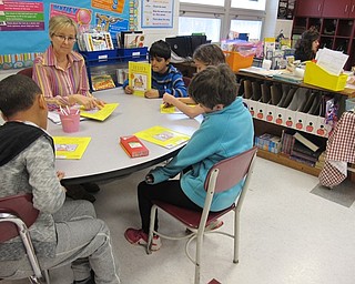 Neighbors | Alexis Bartolomucci.Students worked with teacher, Catherine Curtis, during their reading workshop of Feb. 22 at Robinwood Lane Elementary.