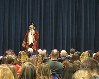 Neighbors | Alexis Bartolomucci.Director Ron Johnson spoke to the audience before the Austintown Middle School students began their performance of "Cinderella" on March 3 and 4.