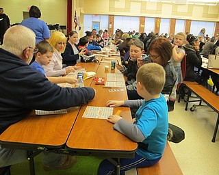 Neighbors | Alexis Bartolomucci.Students and their families played Bingo during the annual Family Bingo Night at Austintown Intermediate School on March 3.
