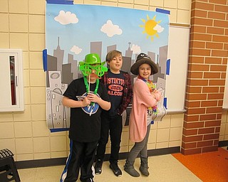 Neighbors | Alexis Bartolomucci.Students dressed up in props for the photobooth at the annual Family Bingo Night at Austintown Intermediate School on March 3.