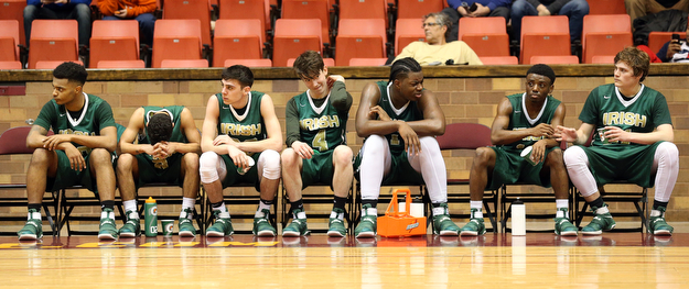 MICHAEL G TAYLOR | THE VINDICATOR- 03-16-17  -Basketball-  4th qtr, on the bench, Ursuline's team reacts to Ursuline's loss .  D2 Regional Semi Final-  Ursuline Irish vs Cleve Central Catholic Iromen at Canton Memorial Civic Center in Canton, OH