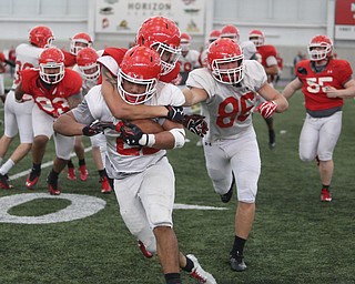 Defense during practice at the Watson and Tressel Training Site, Friday, March 17, 2017, in Youngstown. ..(Nikos Frazier | The Vindicator)..