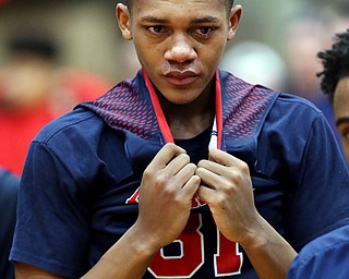 MICHAEL G TAYLOR | THE VINDICATOR- 03-17-17  -Basketball-  JFK's #31 Nate Woods reacts to the loss.  D4 Regional Final, Cleve Luthern East Falcons vs JFK Eagles at Canton Fieldhouse in Canton, OH