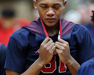 MICHAEL G TAYLOR | THE VINDICATOR- 03-17-17  -Basketball-  JFK's #31 Nate Woods reacts to the loss.  D4 Regional Final, Cleve Luthern East Falcons vs JFK Eagles at Canton Fieldhouse in Canton, OH