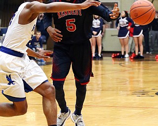 MICHAEL G TAYLOR | THE VINDICATOR- 03-17-17  -Basketball- 2nd qtr, JFK's #5 Bryon Taylor fires a pass.  D4 Regional Final, Cleve Luthern East Falcons vs JFK Eagles at Canton Fieldhouse in Canton, OH