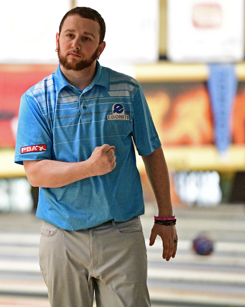 HUBBARD, OHIO - MARCH 19, 2017: Samuel DeWitt III of Neville Island, Pennsylvania pumps his fist after rolling a strike during a qualifying round of the PBA Trumbull County Tourism Bureau Central/East Open, Sunday afternoon at Bell-Wick Bowl.