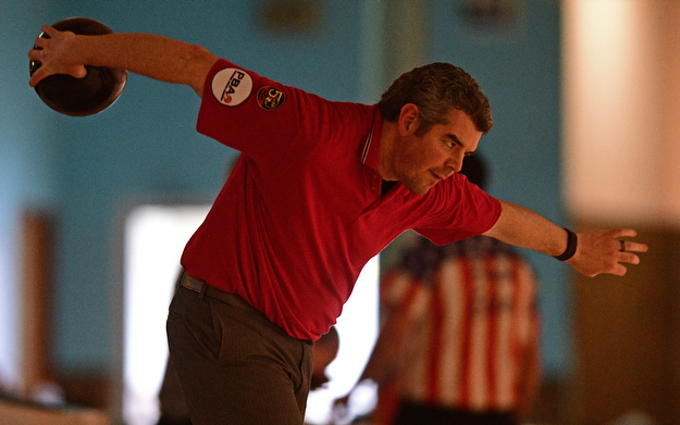 HUBBARD, OHIO - MARCH 19, 2017: Michael Clark Jr. of Cleveland, Ohio throws his ball during a qualifying round of the PBA Trumbull County Tourism Bureau Central/East Open, Sunday afternoon at Bell-Wick Bowl.