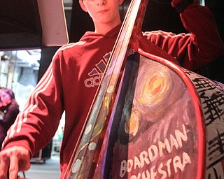 William D. Lewis The Vindicator Boardman HS 9th grade bass player George Morar during rehersal for Project Mayhem concert.