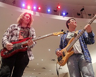 William D. Lewis The Vindicator Boardman HS guitarist Reese Maslen, 11th grade left, and bassist John Beck, 12 th grade during rehersal for Project Mayhem concert.